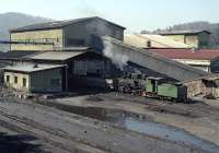 0-8-2 No. 83159 at Oskova washery on the morning of 14th March 2014. The separation plant was down for maintenance at this point so not a loaded train being emptied - a team of men was engaged with picks, shovels etc. in dislodging all the caked coal dust from the bottom of the hopper wagons and shovelling it into the unloading bunkers, under cover to the left.<br><br>[Bill Jamieson 14/03/2014]