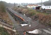 The view north west from Kilnknowe Place road bridge, Galashiels, on 31 March 2014, with Wood Street off to the left and Kilnknowe Park on the right. Up ahead the Peebles Loop began its turn west away from the main line, with the Waverley Route continuing north towards Edinburgh [see image 27597].<br><br>[John Furnevel 31/03/2014]