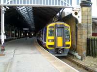 A Northern DMU for Hull and Sheffield via the Yorkshire Coast line waits to leave Scarborough on 20 March 2014.<br><br>[Bruce McCartney 20/03/2014]