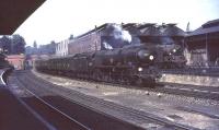 Merchant Navy Pacific 35017 <I>Belgian Marine</I> brings a train into Bournemouth Central in September 1964. Bournemouth MPD (closed in 1967) stands in the background.<br><br>[John Robin 02/09/1964]