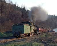 With the sun going down, former JZ 0-8-2 No. 83 159 sets off from the yard at Oskova on 14 March for the short trip to the washery. The trains here typically comprise of fifteen wagons containing about 350t of <I>'coal'</I> - some of it seems to contain a fair proportion of rock so the amount of real coal that comes out of the other end of the washery will be considerably less!<br><br>[Bill Jamieson 14/03/2014]