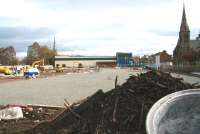 A new role for the old station site at Dalkeith. Scene on 6 April 2014 looking east towards the town centre with Eskbank Road on the right and the car park for the new Supermarket taking shape [see image 43844].<br><br>[John Furnevel 06/04/2014]