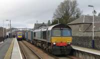 Inverness bound 170405 has cleared the single line section from Pitlochry allowing the southbound Tesco containers to leave Blair Atholl behind DRS 66430.<br><br>[Mark Bartlett 05/04/2014]