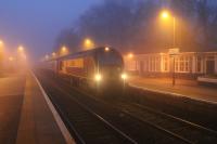 0615 on a misty April morning and the Caledonian Sleeper service is on time as it rolls in to Pitlochry station behind DBS 67004. <br><br>[Mark Bartlett 05/04/2014]