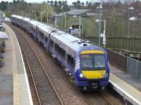 170475 and sister form the 16.15 from Glenrothes with Thornton to Edinburgh on 6 April.  In the background is the former wagon repair shop, subsequently given over to light industrial use and now largely vacant.<br><br>[Bill Roberton 05/04/2014]