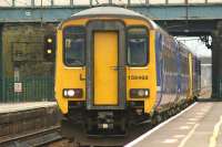 A Northern service from Blackpool to Liverpool arrives at Leyland on 5 April 2014. The 156 DMU has been supplemented with a class 142 as this was Grand National day at Aintree.<br><br>[John McIntyre 05/04/2014]