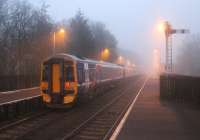 The early morning ECS working from Perth to Blair Atholl, seen at Pitlochry in the first light of Saturday 5 April 2014. 158711 is on the rear of this triple 158 set and will return at the head of the train when it forms the 0712 Blair Atholl to Edinburgh.<br><br>[Mark Bartlett 05/04/2014]