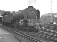 A1 Pacific 60118 <I>Archibald Sturrock</I> takes the 11am Glasgow Queen Street - London Kings Cross <I>'Queen of Scots'</I> Pullman away from the Newcastle stop in the summer of 1962. The train ran over the Leeds Northern route, via Harrogate and Leeds Central, home for the Copley Hill Pacific. [See image 5341]<br><br>[K A Gray 25/08/1962]