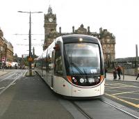 An Airport bound Edinburgh tram at the east end of Princes Street during a test run on 11 April 2014 - complete with familiar backdrop.<br><br>[John Furnevel 11/04/2014]