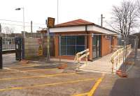 Transformation! When the new ticket office building was delivered to Leyland a month ago [see image 46371] it looked like a portacabin with a door and no windows. On 15 March 2014 it has been transformed with windows, passenger access door and a sloping roof.<br><br>[John McIntyre 15/03/2014]