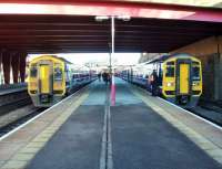 Northern 158s meet at Bradford Interchange on the morning of 24 March. Unit 1588755, on the right, is heading for York while 158753 is on a Calder Valley service to Manchester Victoria. <br><br>[Mark Bartlett 24/03/2014]