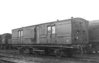 An old coach photographed in the sidings at Hurlford in April 1962. The vehicle is thought to be a former Glasgow & South Western Railway passenger brake van, dating from the early 1900s. [Ref query 5623]<br><br>[David Stewart 17/04/1962]