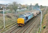 DRS 37425 brings up the rear of a Heysham flask working heading south at Bolton-le-Sands on 20 February with 37601 leading. The train will shortly branch right at Hest Bank onto the chord for Morecambe.<br><br>[Mark Bartlett 20/02/2014]