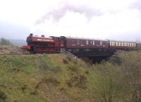 The Pontypool and Blaenavon Railway has recently restored operations to Blaenavon High Level station. This is the last (16.40) service to Furnace Sidings on 20 April passing the Big Pit mining museum [see image 25792]. It's a short run, but a steep gradient; so the sound effects are excellent.<br><br>[Ken Strachan 20/04/2014]