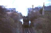 80086 brings the 17.33 ex-St Enoch onto the single line section at Busby on 4 April 1966.<br><br>[G W Robin 04/04/1966]