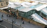 The renovated Market Street entrance to Waverley station on 11 April 2014, with steel and glass construction predominating. The theme is continued along the canopies covering platforms 8 & 9 and the stairway link to the station car park.<br><br>[John Furnevel 11/04/2014]