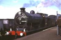 The RCTS <I>Fife Coast Rail Tour</I> at Leuchars Junction on 28 August 1965, with J37 0-6-0 no 64569 preparing to set off for Thornton Junction via the Fife Coast line. At Thornton the J37 will hand over to no 249 <I>Glen Douglas</I> for the remainder of the tour. [See image 45866]<br><br>[G W Robin 28/08/1965]