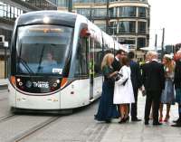 Now just a normal part of the day-to-day traffic on the city streets. An Edinburgh tram passes the Haymarket stop on 11 April 2014 during a test run to York Place - without turning a head.<br><br>[John Furnevel 11/04/2014]