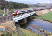 A Virgin Pendolino from Edinburgh to London Euston crosses Crawford Viaduct on 17 March 2014.<br><br>[Bill Roberton 17/03/2014]