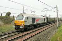 Silver liveried 67026 <I>Diamond Jubilee</I> brings up the rear on the Royal Train passing Carnforth on 9 April 2014 conveying HRH The Prince of Wales to Oxenholme.<br><br>[Mark Bartlett 09/04/2014]
