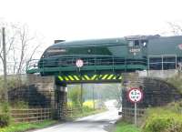 60009 crosses Beatlie Road, Winchburgh, with the morning <I>Fife Circle</I> tour on 27 April 2014.<br><br>[Jim Peebles 27/04/2014]