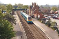 An Arriva Trains Wales service from North Wales to Manchester Piccadilly calls at Frodsham station on 28 April 2014.<br><br>[John McIntyre 28/04/2014]