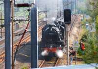 Following behind the GB VII tour on 29 April 2014 were Black 5s 44871 and 45407, moving north from Grosmont on the NYMR to Edinburgh in readiness for Day 5 and the run from Edinburgh to Stranraer. The locos are being refreshed in the down passenger loop at Lockerbie from some fire hoses.<br><br>[John McIntyre 29/04/2014]