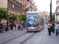 <I>Look - no wires!</I> Tram 304 running in battery mode along interlaced tracks in Archivo de Indias on a non-catenary section of Seville's 2.2 km city route T1 in May 2013.  The Urbos 3 vehicles, built by CAF, feature an Energy Accumulation System enabling them to operate wirelessly over certain sections of the network. [See image 47207]<br><br>[Andrew Wilson 01/05/2013]