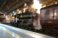 On the back of the 5Z45 move from Cadder Yard to Castleton Junction on the evening of 2 May 2014 , Black 5 44871 is watered at Preston, along with 45407 on the front of the train. [See image 47195]<br><br>[John McIntyre 02/05/2014]