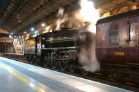 On the back of the 5Z45 move from Cadder Yard to Castleton Junction on the evening of 2 May 2014 , Black 5 44871 is watered at Preston, along with 45407 on the front of the train. [See image 47195]<br><br>[John McIntyre 02/05/2014]