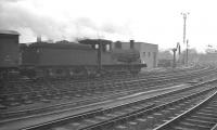 Gateshead based J25 0-6-0 no 65728 takes an up goods past Newcastle Central on the goods lines in October 1962, approximately 2 months before withdrawal.<br><br>[K A Gray 10/02/1962]