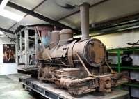 Davenport 0-4-0 tender locomotive, discovered tree bound at the Bihar State Sugar Factory and brought back to the UK - complete with tree stumps. Now awaiting attention on the Statfold Barn Railway.<br><br>[Peter Todd 29/03/2014]