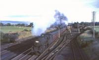 Black 5 no 44868 restarts a northbound train from Beattock on the last day of July 1965. 42694 is working hard at the rear.<br><br>[John Robin 31/07/1965]