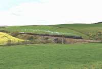 A4 60009 <I>Union of South Africa</I> south of Huntly on 1 May 2014 heading for Aberdeen with the <I>Great Britain VII</I>.<br><br>[John Gray 01/05/2014]