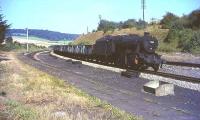 Stanier 8F 2-8-0 no 48611 off Woodford Halse shed brings a freight through West Wycombe in the summer of 1964.<br><br>[John Robin 26/08/1964]