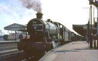 Ex-GWR Hall class 4-6-0 no 5933 <I>Kingsway Hall</I> waiting to leave Oxford in the summer of 1964, having just taken over a train bound for York. <br><br>[John Robin 27/08/1964]