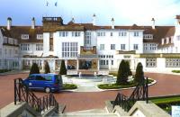 The main entrance to Turnberry - at the back of the building, where the covered passageway used to lead from the station. To the left of the entrance, under the tower, in the middle of the sandstone area between the windows, the crest of the G&SWR is displayed.<br><br>[Colin Miller 11/05/2014]