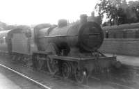 Class 2P 4-4-0 no 40686 at Dumfries in 1961. Note the buffer beam semaphore route indicator set for Glasgow via Kilmarnock and Barrhead.  <br><br>[David Stewart //1961]