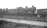 A grey and damp day at Feltham in October 1959 sees Maunsell D1 no 31727 amongst the stored locomotives in the sidings. The 4-4-0, built by Sharp Stewart in 1901, was eventually cut up at Ashford Works in May 1961. <br><br>[K A Gray 05/10/1959]