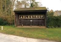 The station nameboard and a bench (with GWR scrollwork) from Adlestrop station in use in the village bus shelter on 4 March 2014, some distance from the railway. The station closed in 1966 but is remembered in a poem by Edward Thomas when a train he was on stopped at the station in June 1914. Edward Thomas was killed in action at the Battle of Arras in 1917.<br><br>[John McIntyre 04/03/2014]