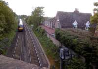 The site of Shustoke station, between Nuneaton and Birmingham, closed in March 1968 and seen here looking West in May 2014. The main building has since been extended to become <I>Ye Olde Station Guest House</I>. [Ref query 9430] <br><br>[Ken Strachan 11/05/2014]