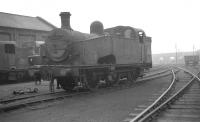 A Gresley J50 0-6-0T stands in the works yard at Doncaster in October 1962. After being withdrawn from Ardsley shed in November 1960 as 68914 this locomotive was renumbered as Departmental No 11 and served as a works shunter here until May 1965.<br><br>[K A Gray 07/10/1962]