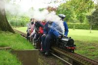 A scale model of LNER B1 no 61264 hauls a non scale load around the Leyland Society of Model Engineers 'small' circuit in Worden Park on 11 May 2014. The larger scale track runs out into the park and features Worden Parkway station.<br><br>[John McIntyre 11/05/2014]