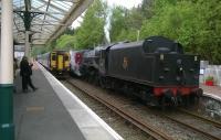 Dalmally station on 14th May saw 156500 on the 1256 from Oban to Glasgow crossing 45407 and <I>The Highlands & Islands Explorer</I> with sister Black 5 44871 on the rear. This was Day 6 for the steam excursion, which ran from Fort William to Oban and back.   <br><br>[Malcolm Chattwood 14/05/2014]