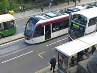 Edinburgh tram 252 heads east along Princes Street on 30 May 2014, the day before the commencement of fare paying passenger services.<br><br>[Bill Roberton 30/05/2014]