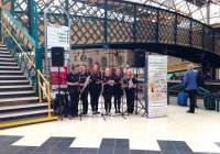 WW1 songs  being enjoyed by an appreciative audience at Carlisle station on 31 May 2014. The performers are <I>Centre Stage</I>, a youth group based in Langholm.<br><br>[Bruce McCartney 31/05/2014]