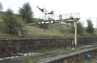 The gantry at Hellifield South Junction looks to have seen better days, although it has altered relatively little since the end of steam with, as far as I can tell, just the loss of one calling-on arm, which was mounted on a very short doll just to the left of the lower arm giving access to the Blackburn line.<br><br>[Bill Jamieson 24/04/2014]