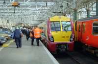 The inaugural run of a class 334 to Gourock waiting to leave Glasgow Central in 2001.<br><br>[Ewan Crawford //2001]