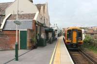 Although the Lymington branch was electrified in 1967, the half hourly service has been maintained by diesel units on weekdays since withdrawal of the last <I>slam door</I> EMUs in 2010 [see image 27862]. SWT 158886 pulls away from a very clean looking Lymington Town station on 20 May 2014 bound for Brockenhurst. <br><br>[Mark Bartlett 20/05/2014]