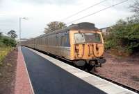 EMU 305517 waits to leave North Berwick with a train for Edinburgh in early 2001, not long before these units began to be replaced by class 322s. [See image 3303]<br><br>[Ewan Crawford //2001]